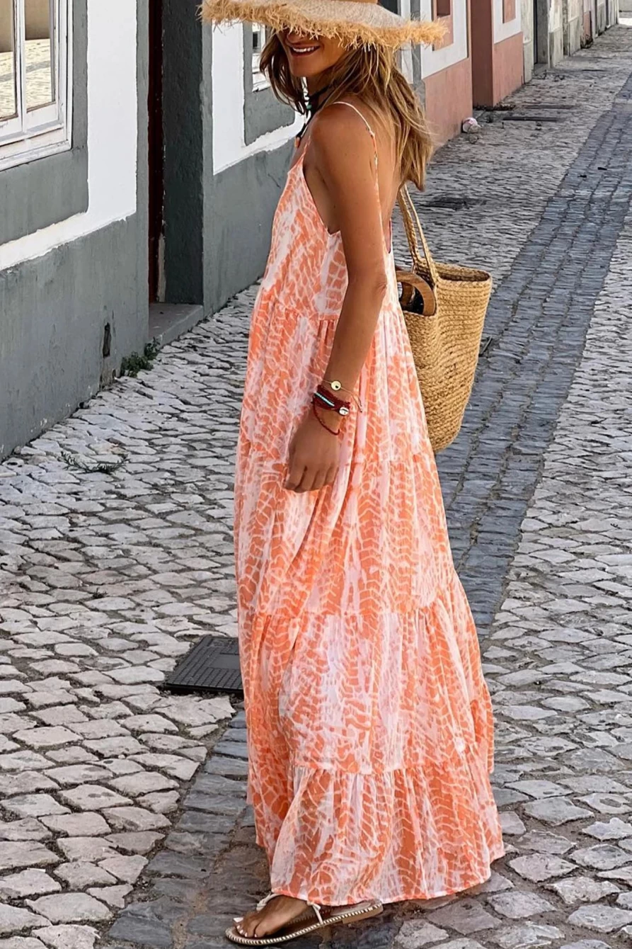 Shewin Women's Orange Abstract Print Backless Tiered Maxi Dress