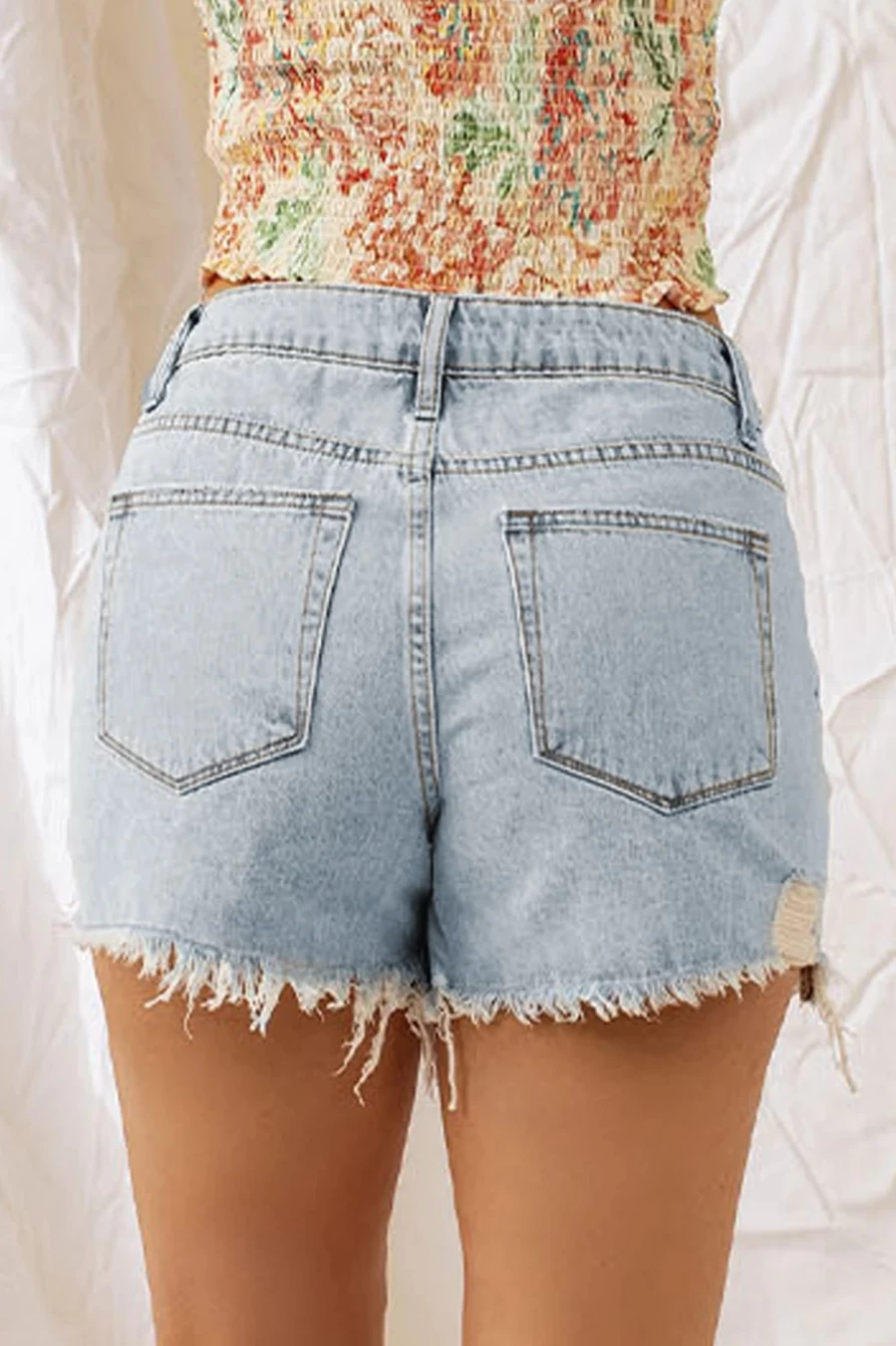 Women's Sky Blue Distressed Washed Raw Hem Denim Shorts by Shewin