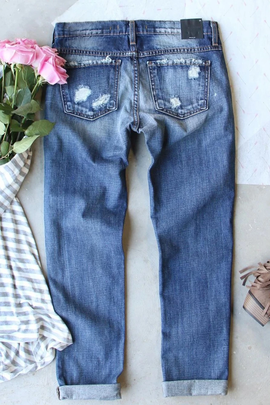 Shewin Women's Sky Blue Distressed Jeans with Glitter Clover Patch & Plaid Graphic Insert
