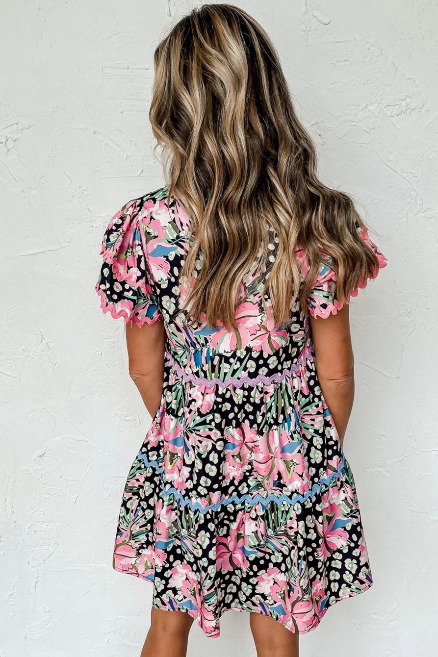Shewin Women's Pink Floral Print V-Neck Mini Dress with Wavy Embellishments