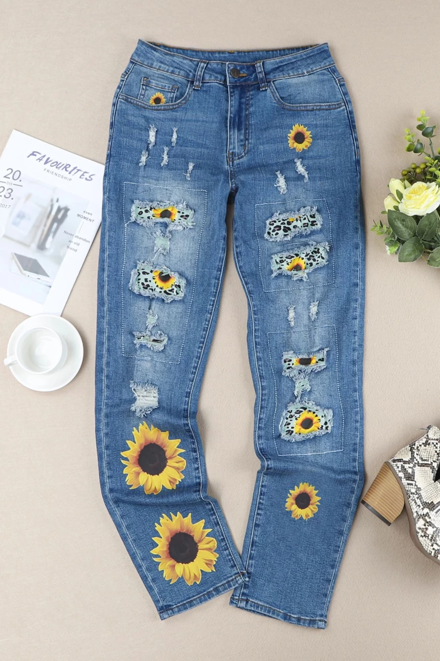 Shewin Women's Sky Blue Ripped Straight Leg Jeans with Sunflower Graphic Print Mid Rise Denim