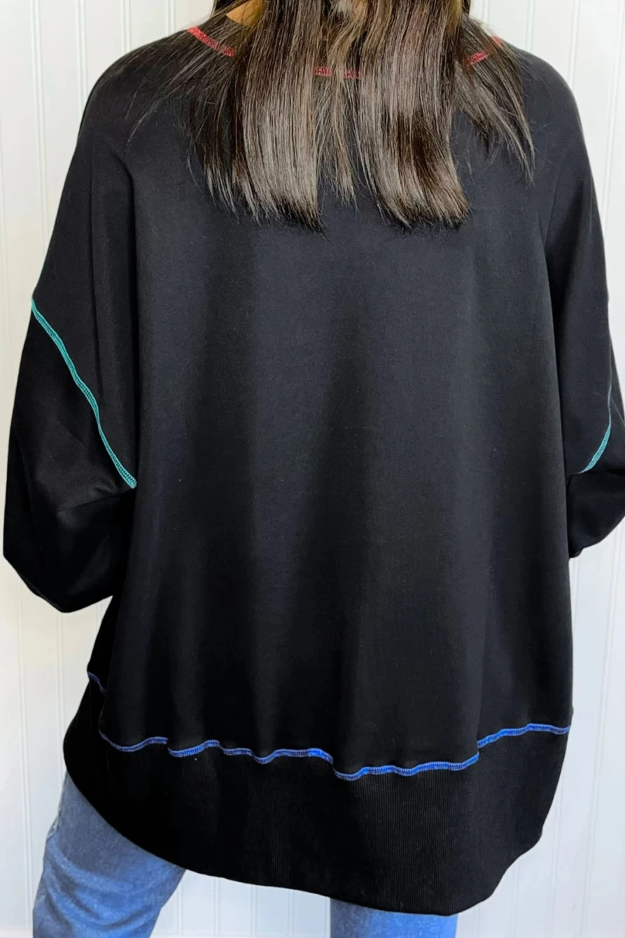 Shewin Women's Black Sequin Clover Graphic Split Lantern Sleeve Sweatshirt with Exposed Seams
