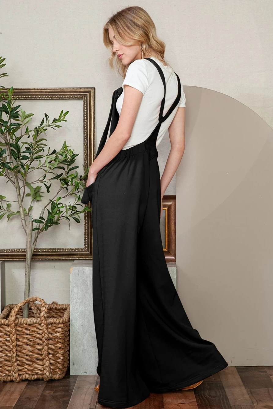 Shewin Women's Black Wide Leg Jumpsuit with Patch Pockets and Knot Strap Detail