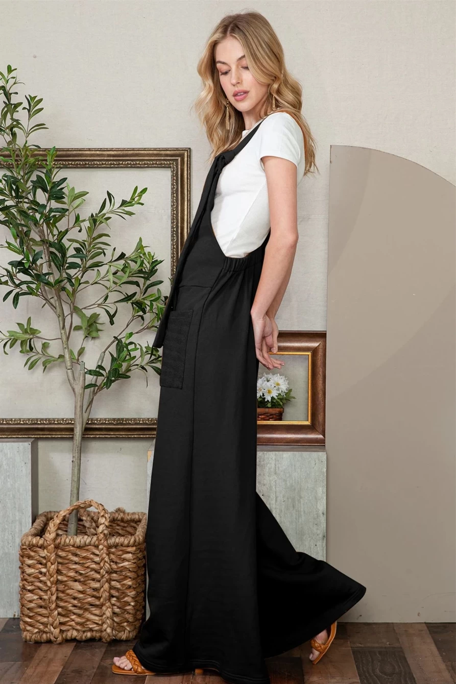 Shewin Women's Black Wide Leg Jumpsuit with Patch Pockets and Knot Strap Detail