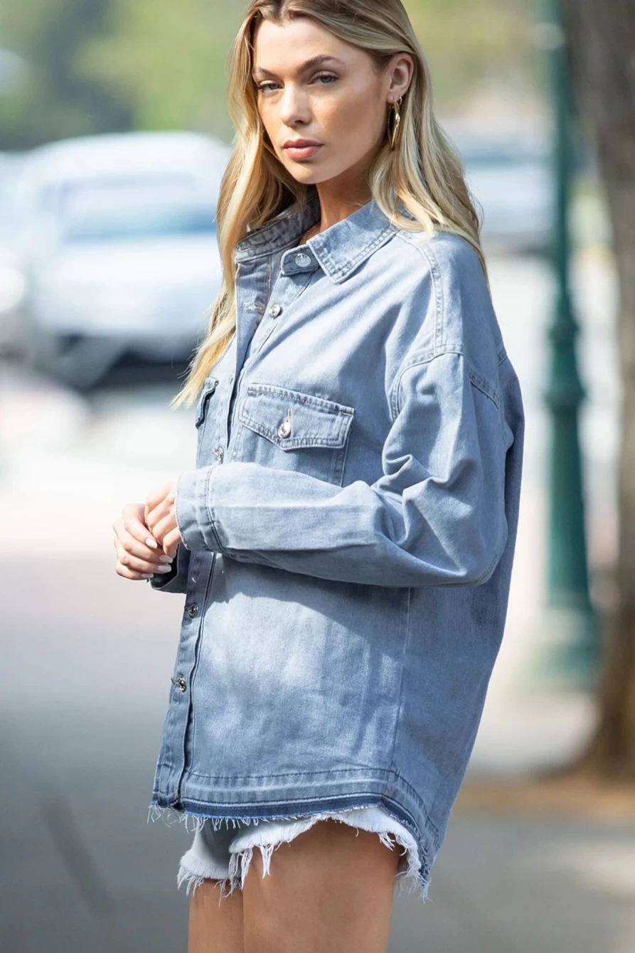 "Shewin Women's Sky Blue Oversized Denim Jacket with Flap Pockets & Button Detail"