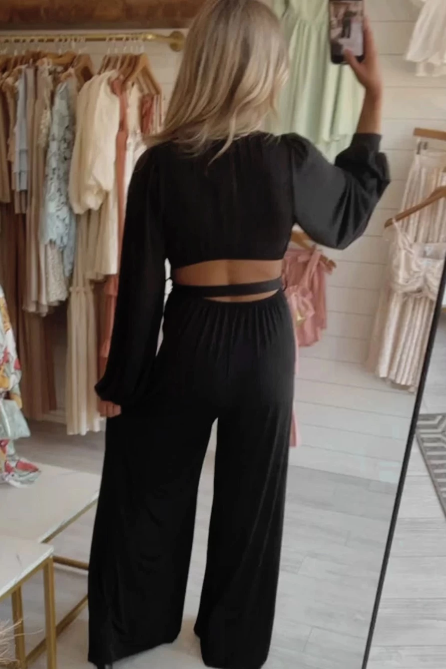 Shewin Women's Black Cutout Back Deep V-Neck Belted Wide Leg Jumpsuit