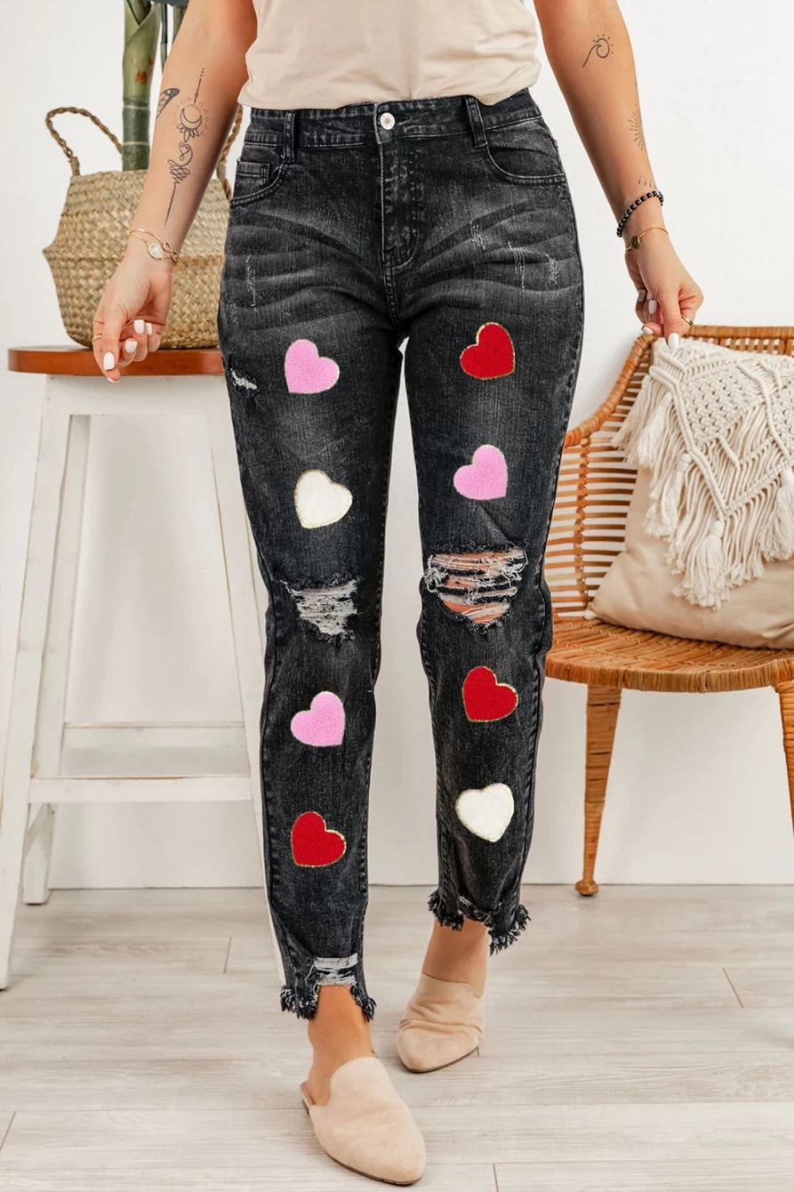 Shewin Women's Black Ripped Washed Jeans with Chenille Heart Patch Detail