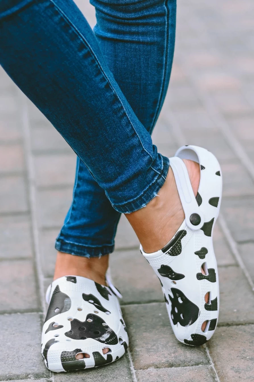 Shewin Women's Bright White Cow Print Slip-On Classic Clogs