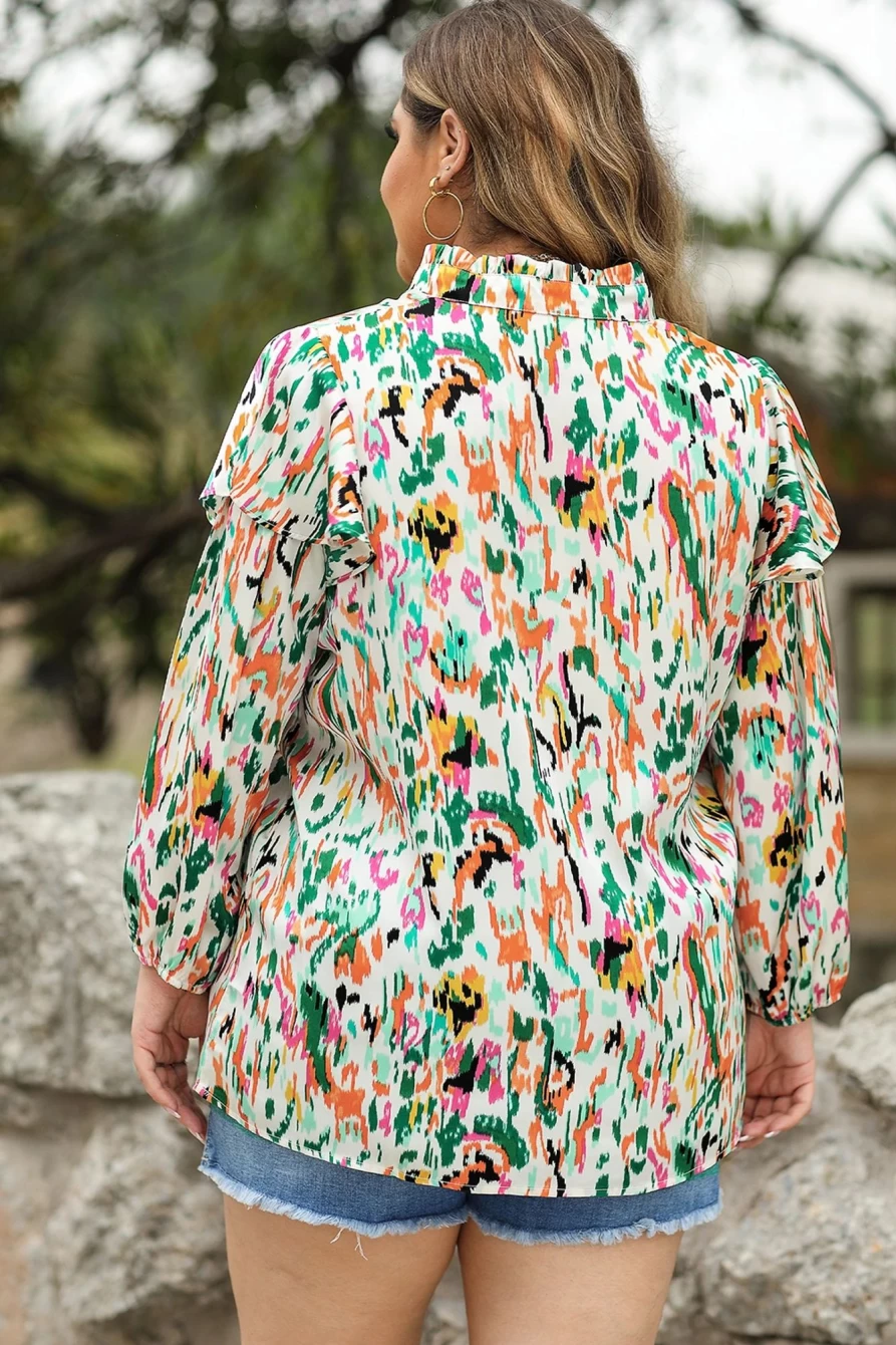 Shewin Women's Plus Size Abstract Print Ruffled V-Neck Blouse in Multicolor