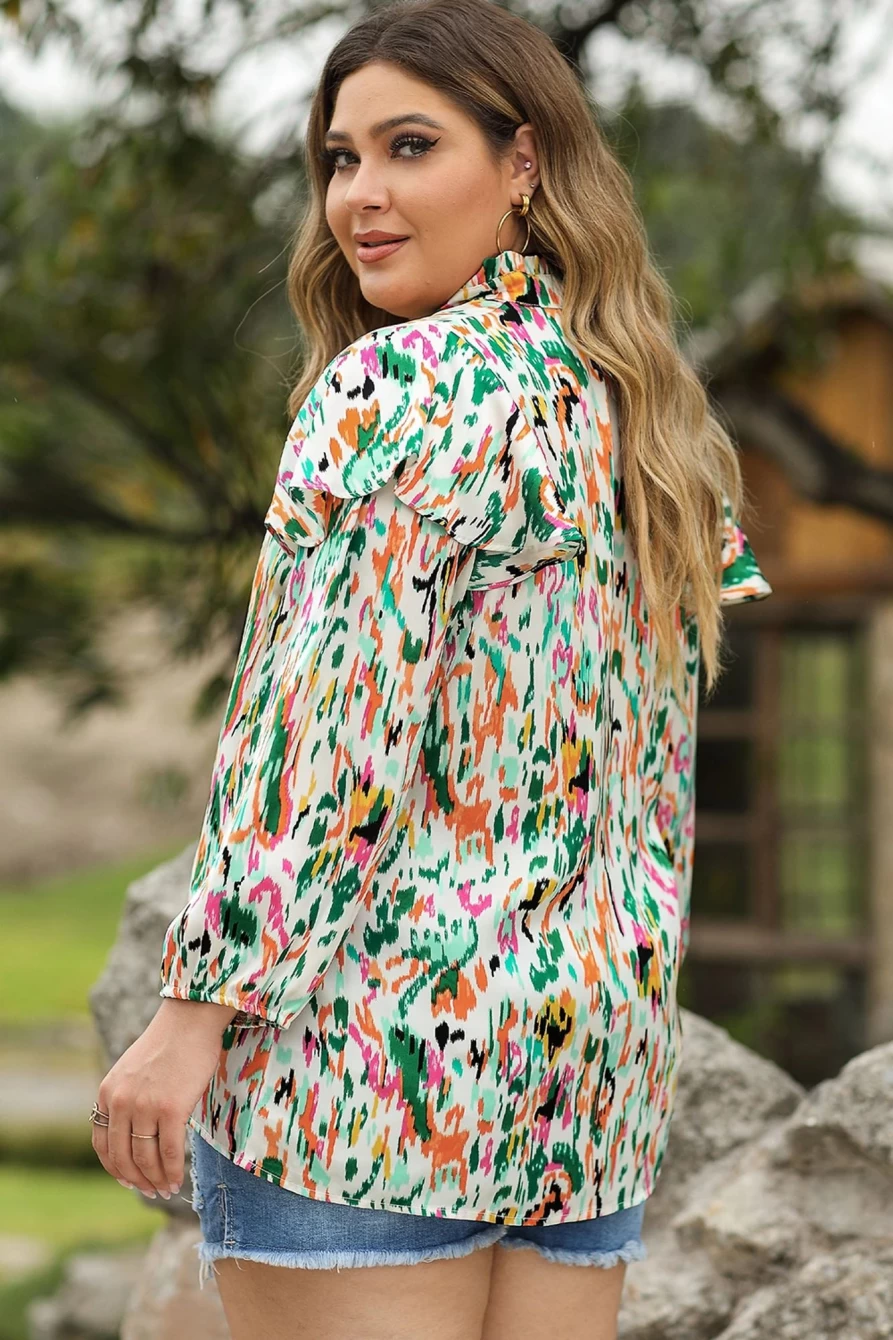Shewin Women's Plus Size Abstract Print Ruffled V-Neck Blouse in Multicolor