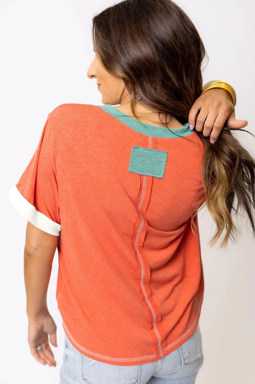 Shewin Women's Grapefruit Orange Contrast Trim Exposed Seam V-Neck T-Shirt