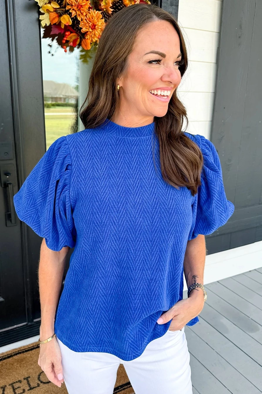 Shewin Women's Sky Blue Solid Textured Puff Sleeve Mock Neck Blouse