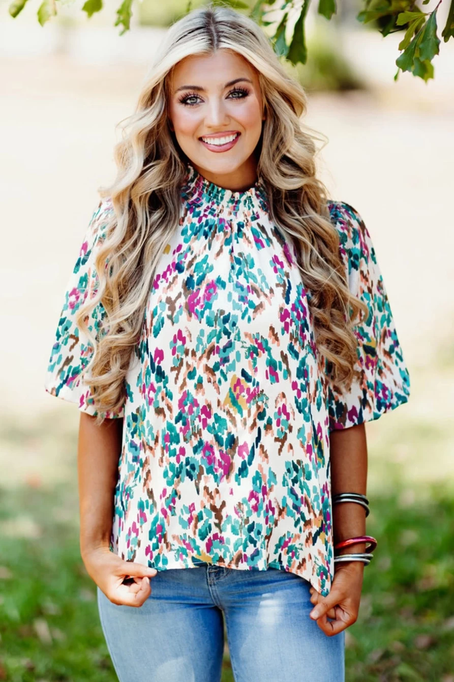 Shewin Women's Light Blue Abstract Print Puff Sleeve Mock Neck Blouse
