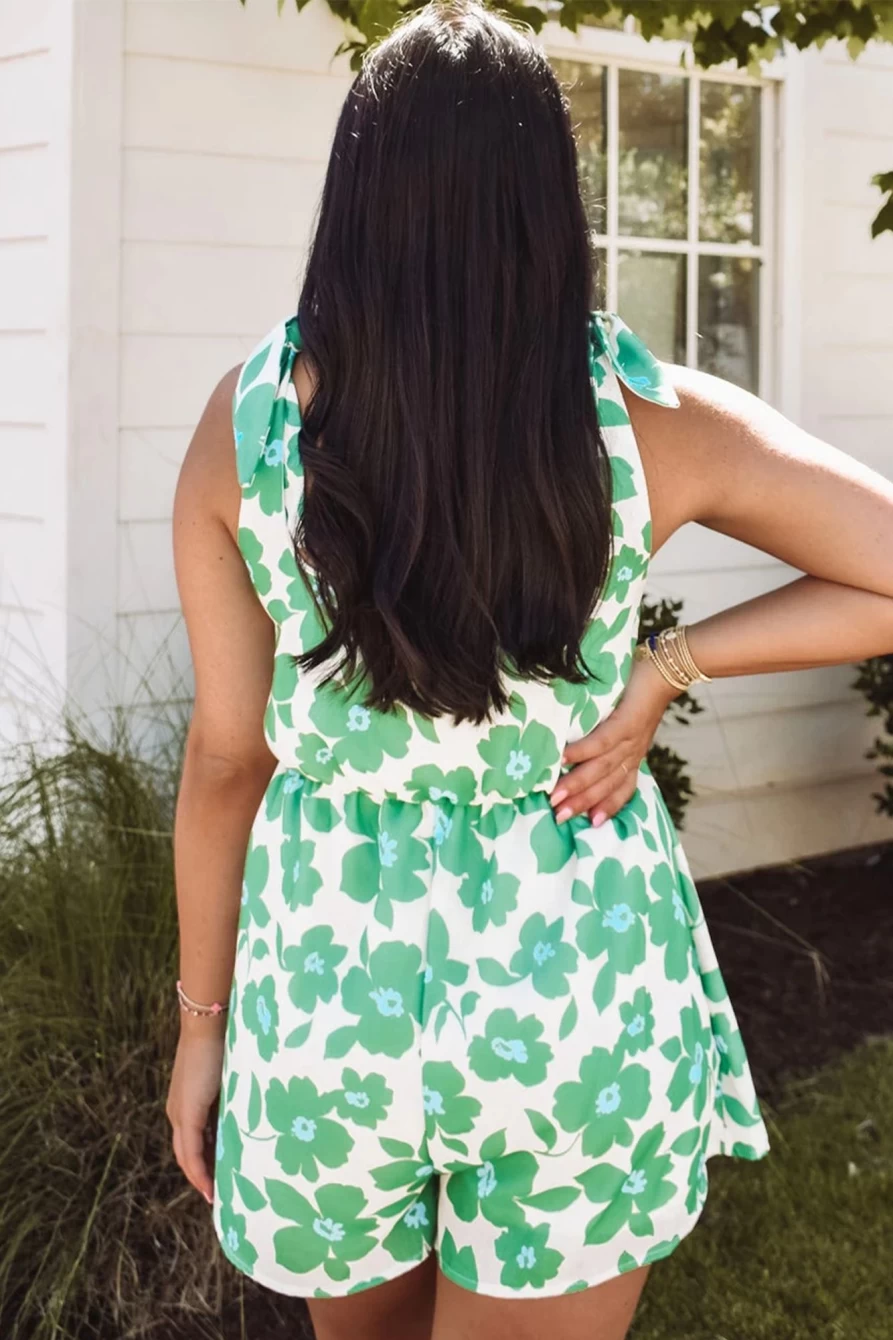 Shewin Women's Green Floral Print Knotted Strap Flared Romper Jumpsuit