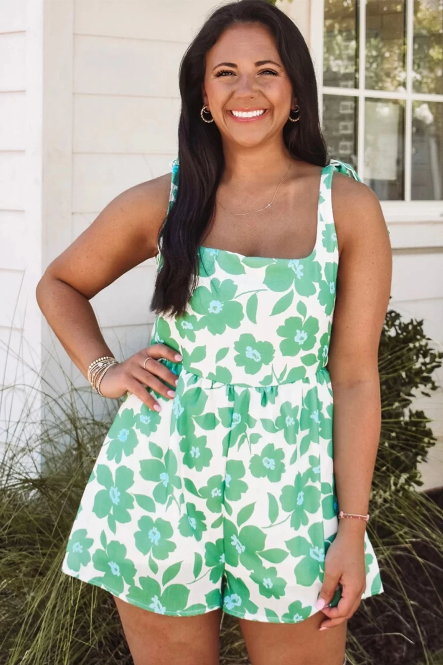 Shewin Women's Green Floral Print Knotted Strap Flared Romper Jumpsuit